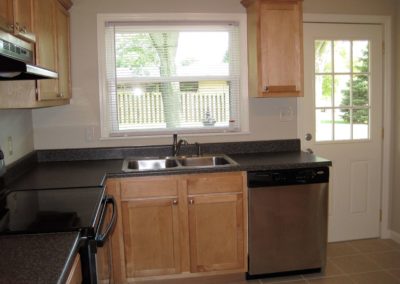 1507-W.-John-Kitchen-door-to-backyard-400x284