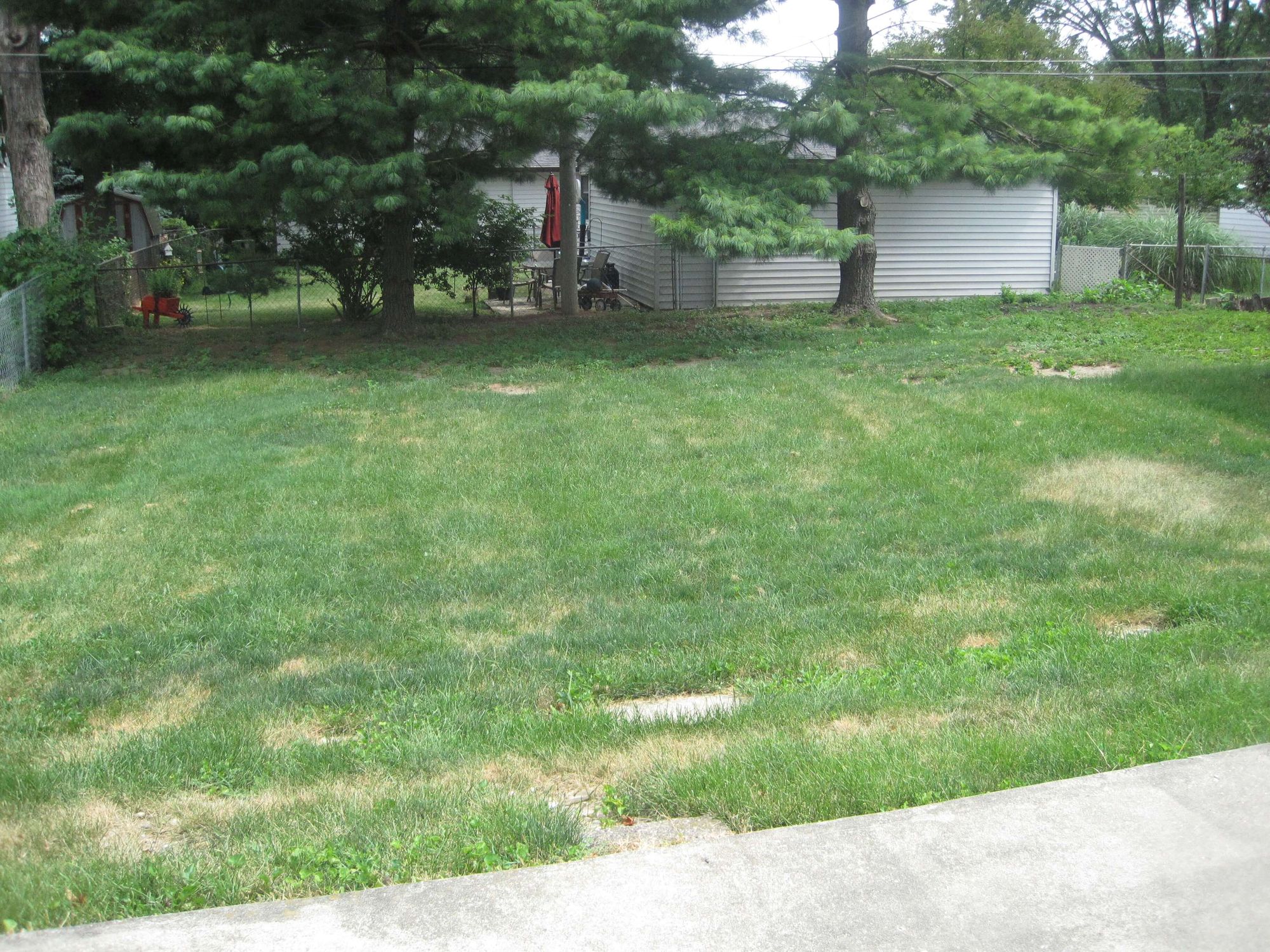 1706-W.-White-Backyard